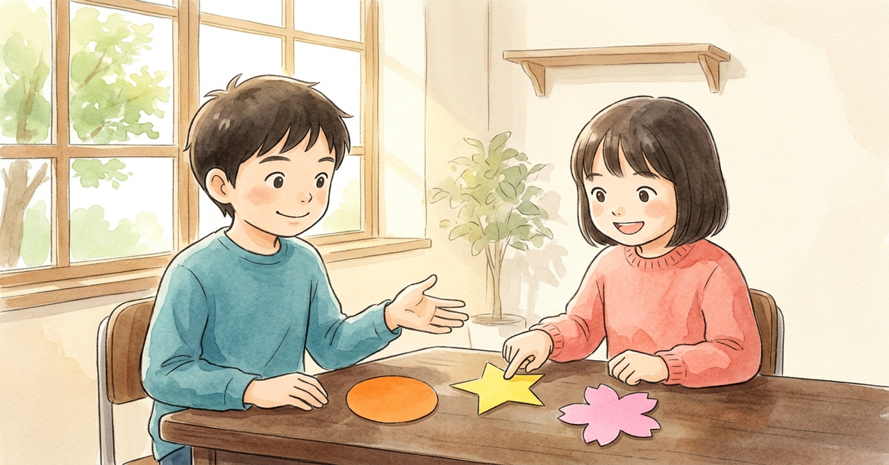 机に丸・星・花の形の色紙を並べ、男の子が女の子に「どれがいい？」と手を向けてたずね、女の子が星を指さす。